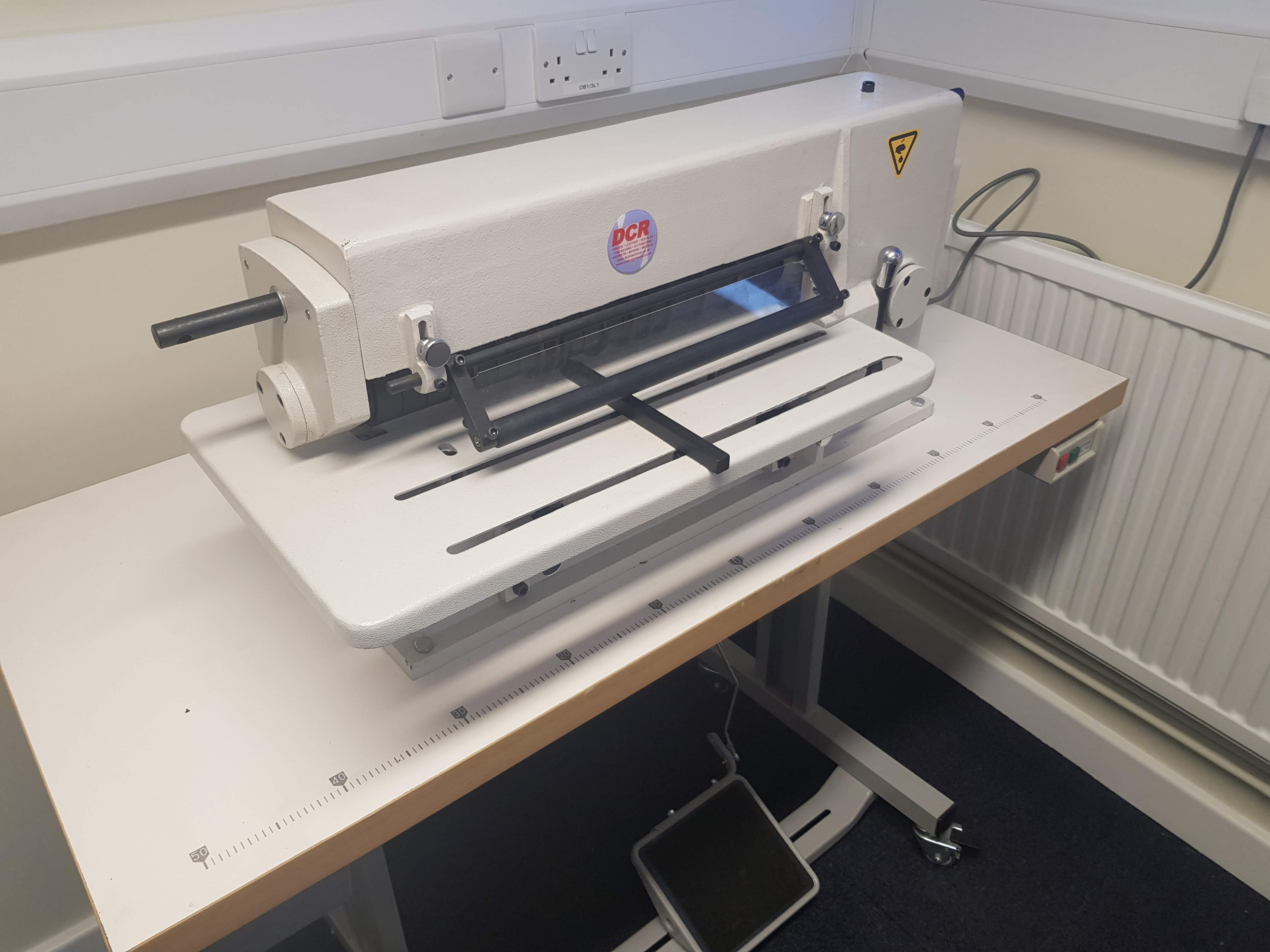 Photo of an DCR-SC400 STRIP CUTTING MACHINE Industrial Sewing Machines